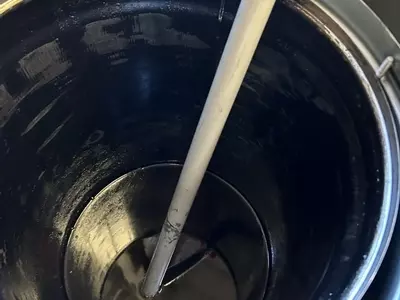 Industrial hot pressure washer boiler jacket filled with fuel and water after burst coil removal during repair in Atherstone.